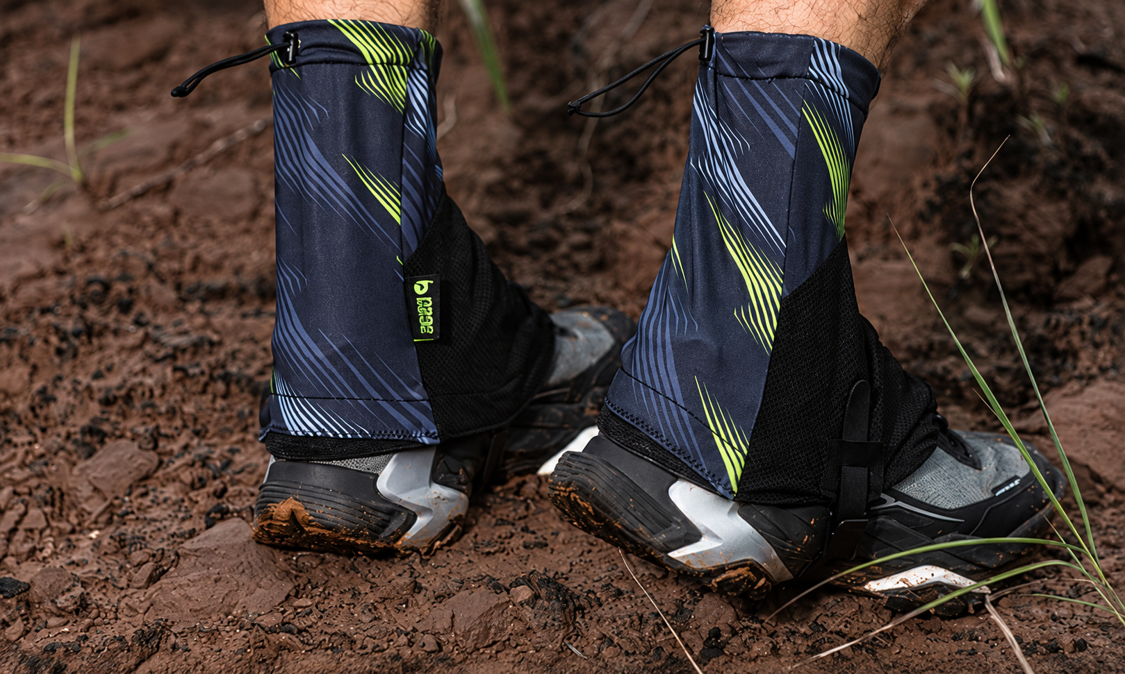 Rear view showing gaiter coverage around the heels of two walking shoes